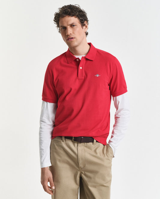 Polo piqué coupe droite avec écusson